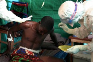 Doctors attending to a victim in Congo