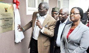 Governor Babatunde Fashola of Lagos State (left) inaugurating a health facility