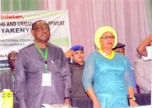 Permanent Secretary in the Ministry of Lands, Housing & Urban Development, George Ossi, with the Deputy Governor of Akwa Ibom State, Valerie Ebie, at the event.